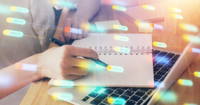 Multi exposure of woman's hands on background with technology and digital coding icons. Data development concept.